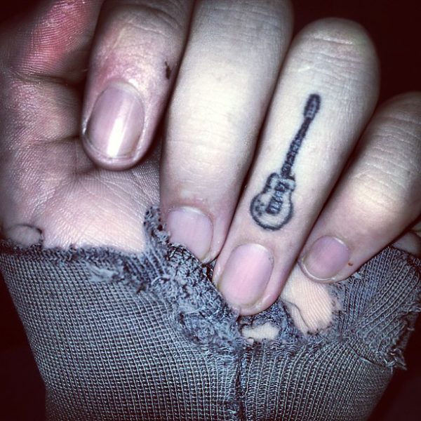 Cool Guitar Finger Tattoo