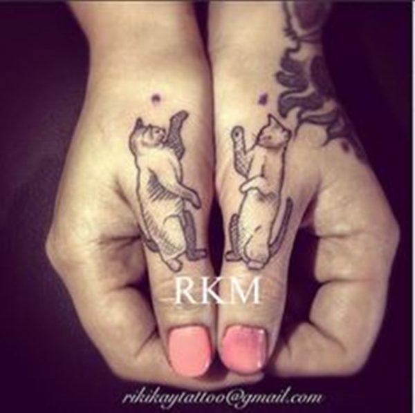 Cute Cat Finger Tattoo