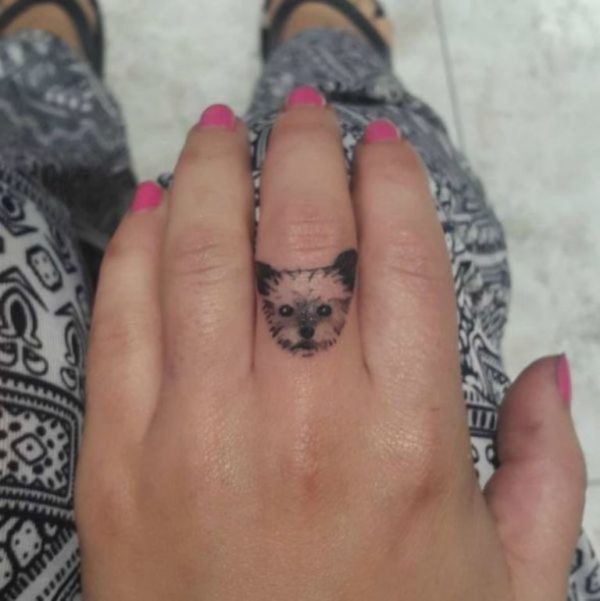 Cute Dog Face Tattoo On Middle Finger
