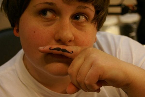 Cute Finger Mustache Tattoo