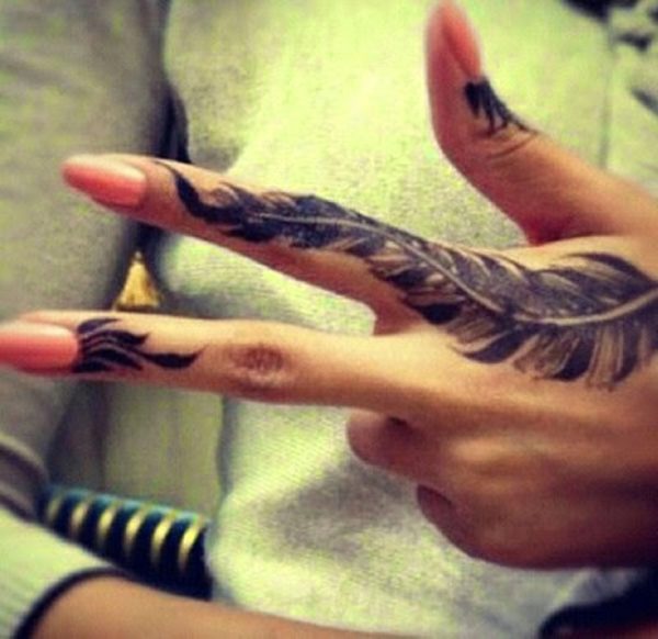 Designer Feather Finger Tattoo
