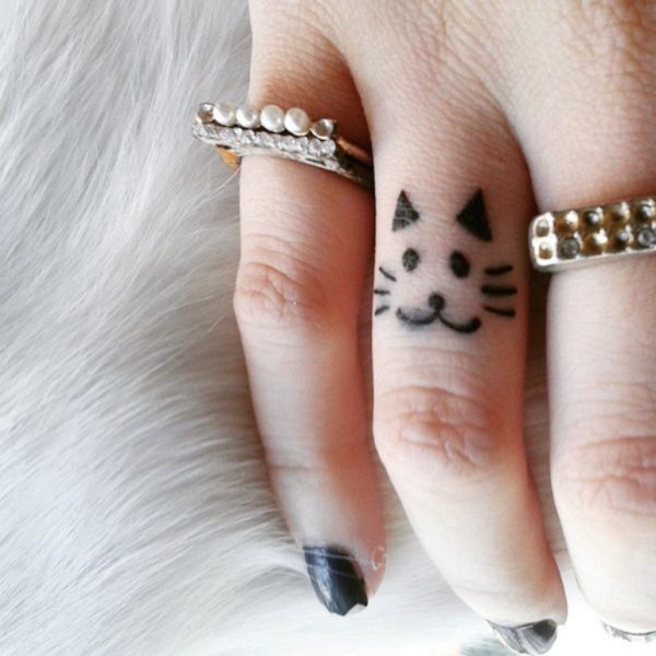 Elegant Cat Tattoo On Ring Finger