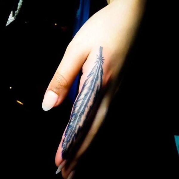 Feather On Finger Tattoo