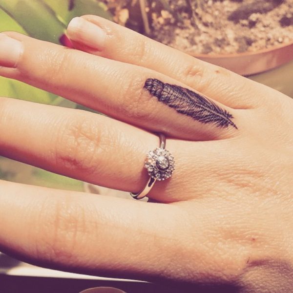 Feather Tattoo On Ring Finger
