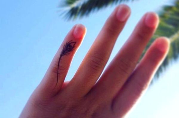 Feather Tattoo On Small Finger