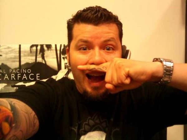 Finger Mustache Tattoo