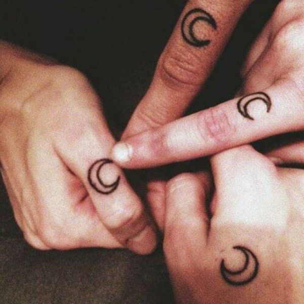 Four Moon Tattoo On Finger