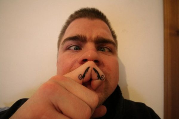 Funny Finger Mustache Tattoo