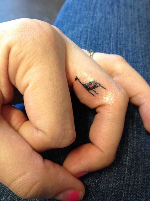 Giraffe Tattoo On Finger