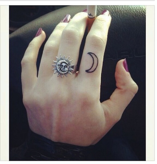 Half Moon Tattoo On First Finger
