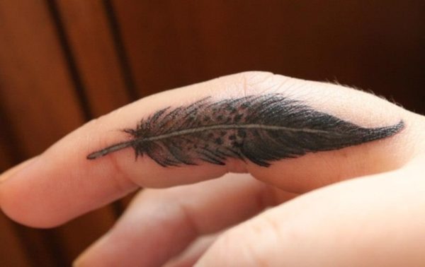 Impressive Feather Tattoo On Finger