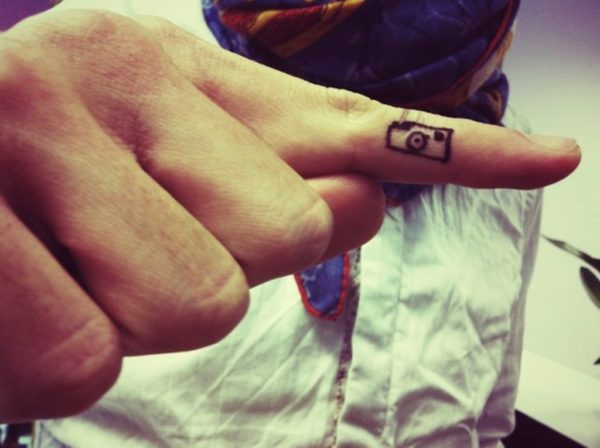 Lovely Camera Tattoo On Finger