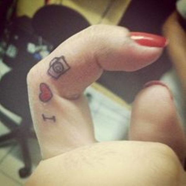 Love Camera Tattoo On First Finger
