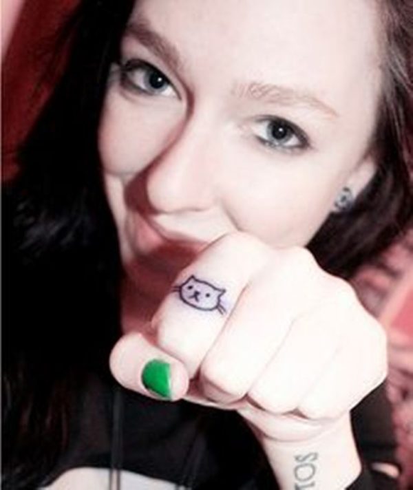 Lovely Cat Tattoo On Finger