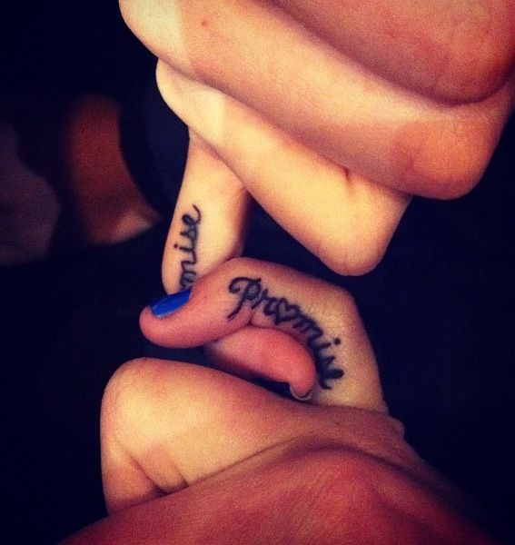 Lovely Promise Tattoo On Finger
