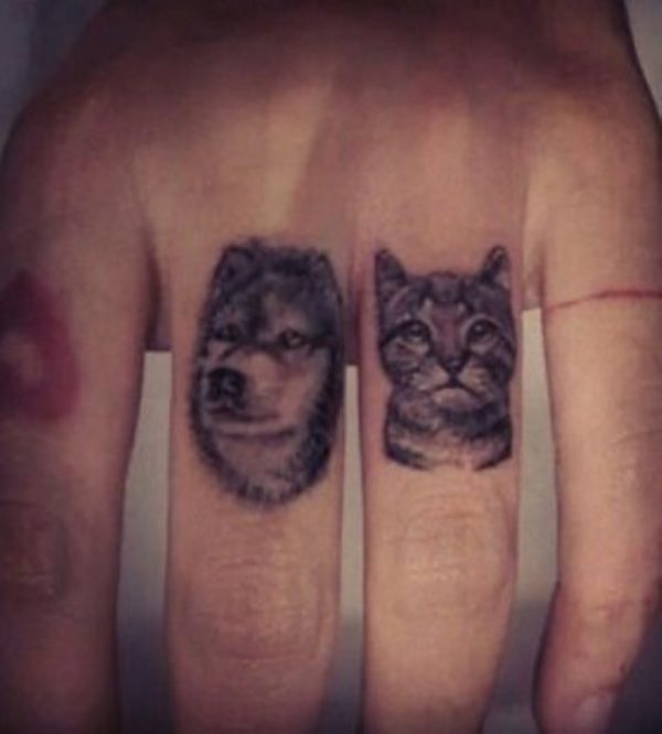 Lovely Dog And Cat Tattoo On Finger