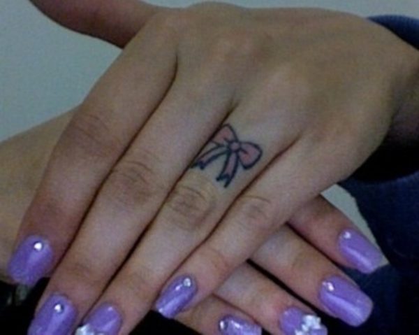 Nice Bow Finger Tattoo