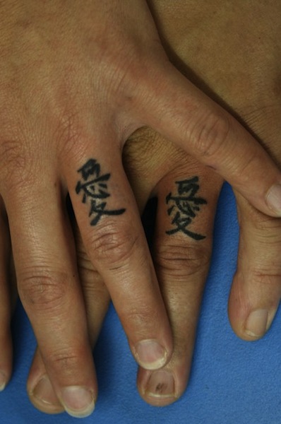 Nice Chinese Finger Tattoo