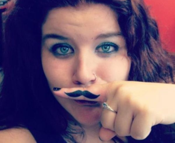 Nice Finger Mustache Tattoo