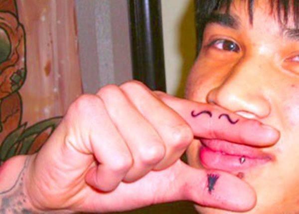 Nice Mustache Tattoo On Finger