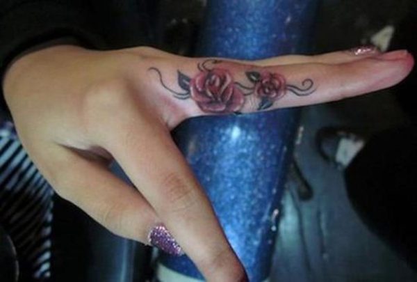 Nice Roses Tattoo On Finger