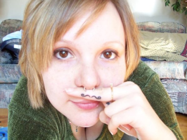 Nice Small Fingerstache Tattoo