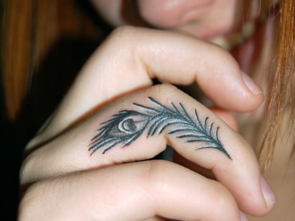 Peacock Feather Tattoo On Finger