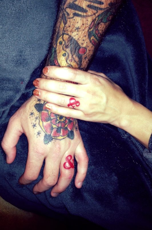 Red Ampersand  Finger Tattoo