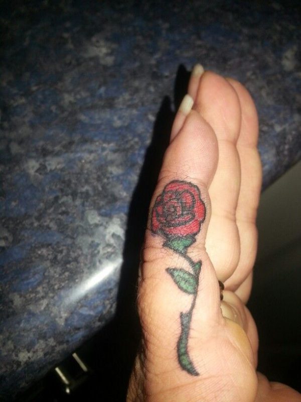 Red Rose Tattoo On Finger