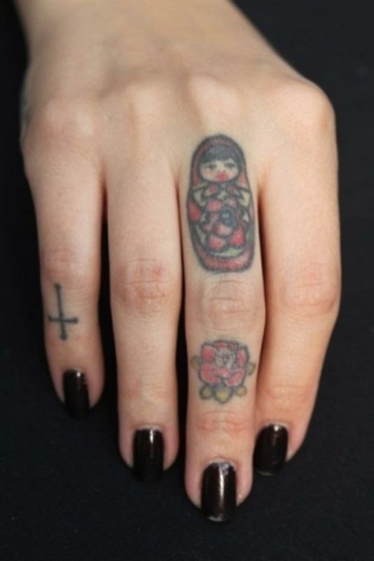 Red Rose Tattoo On Middle Finger