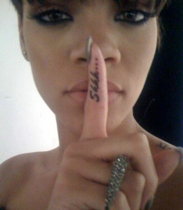 Rihanna With Shhh Finger Tattoo