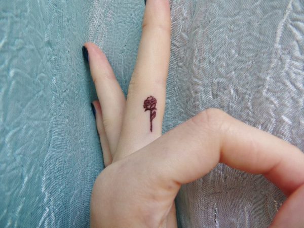 Small Black Rose Tattoo