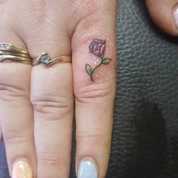 Small Red Rose Tattoo On Finger