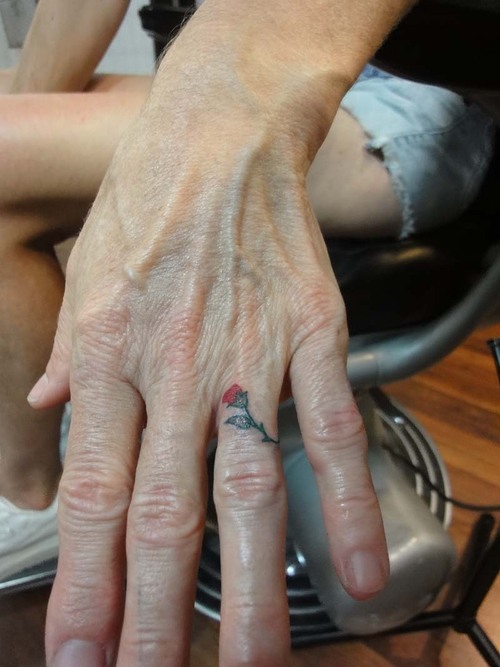 Small Rose Tattoo On Ring Finger