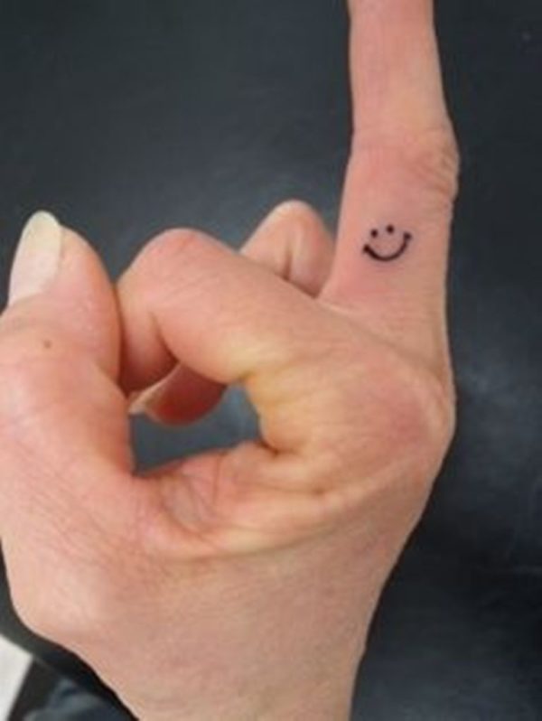 Smiley Tattoo On Finger