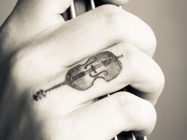 Stunning Guitar Tattoo On Finger