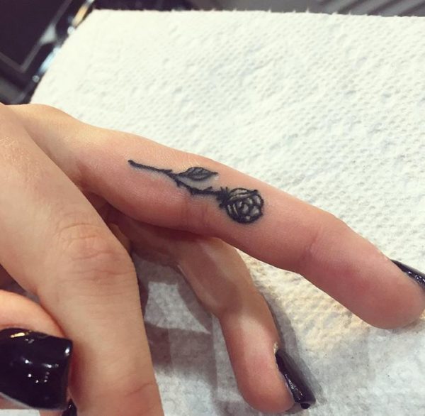 Stunning Rose Tattoo On Middle Finger