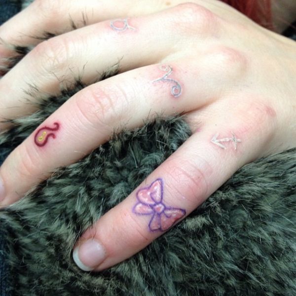 Stylish Bow Tattoo On Little Finger