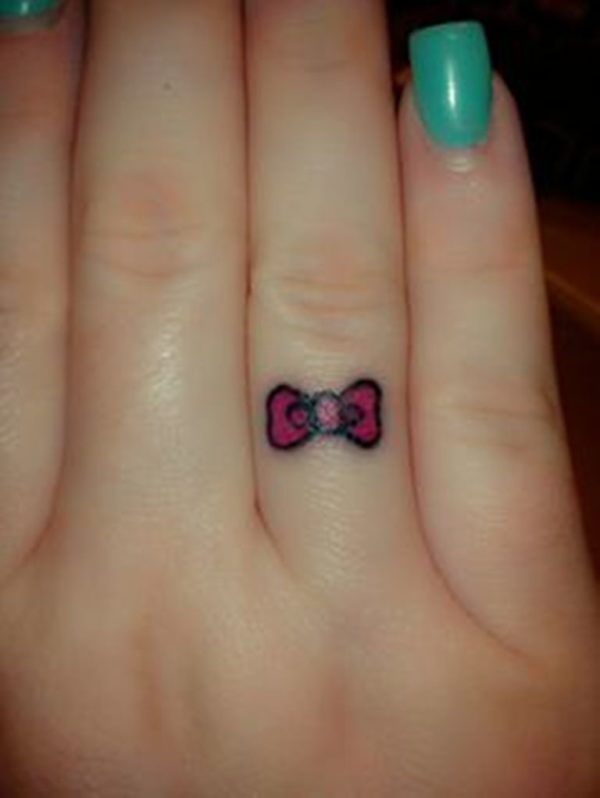 Sweet Bow Tattoo On Ring Finger