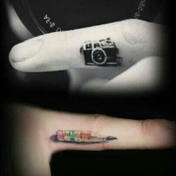 Tiny Camera Tattoo On Finger