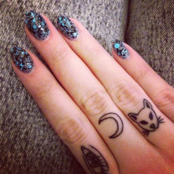 Tiny Moon Tattoo On Finger