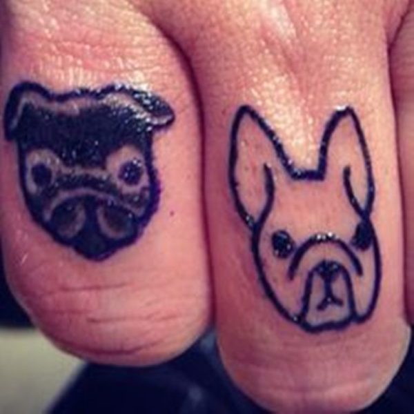Tribal Dog Tattoo On Finger