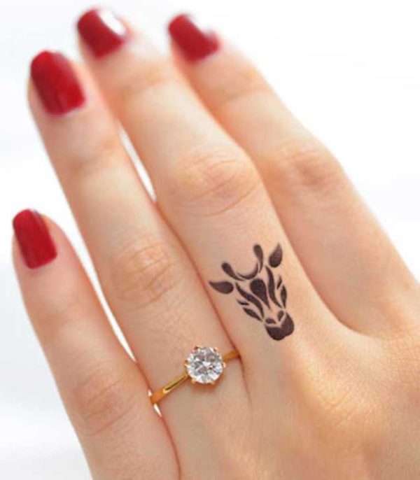 Tribal Giraffe Tattoo On Finger