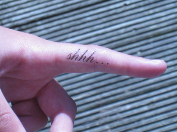 Unique Shhh Tattoo On Finger