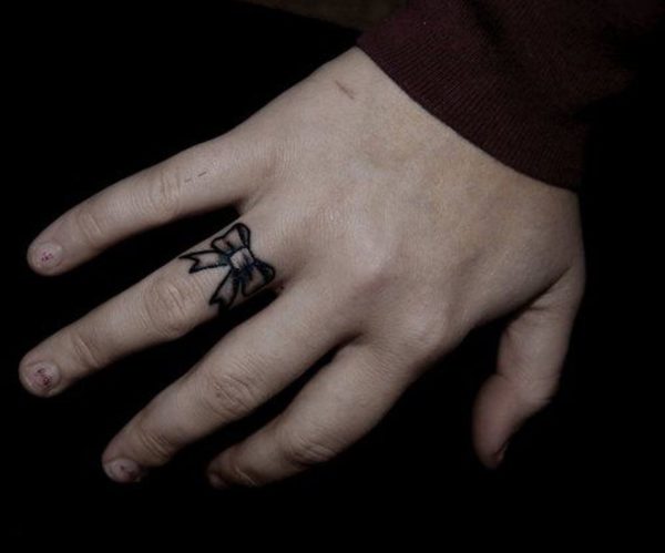 Wonderful Bow Tattoo On Ring Finger