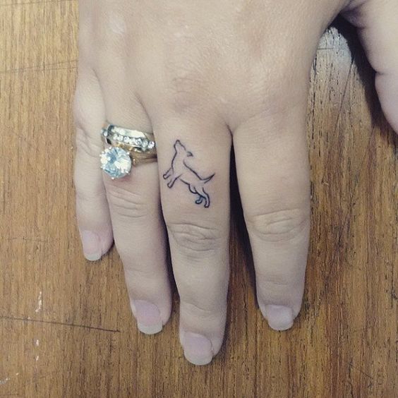 Wonderful Dog Tattoo On Finger